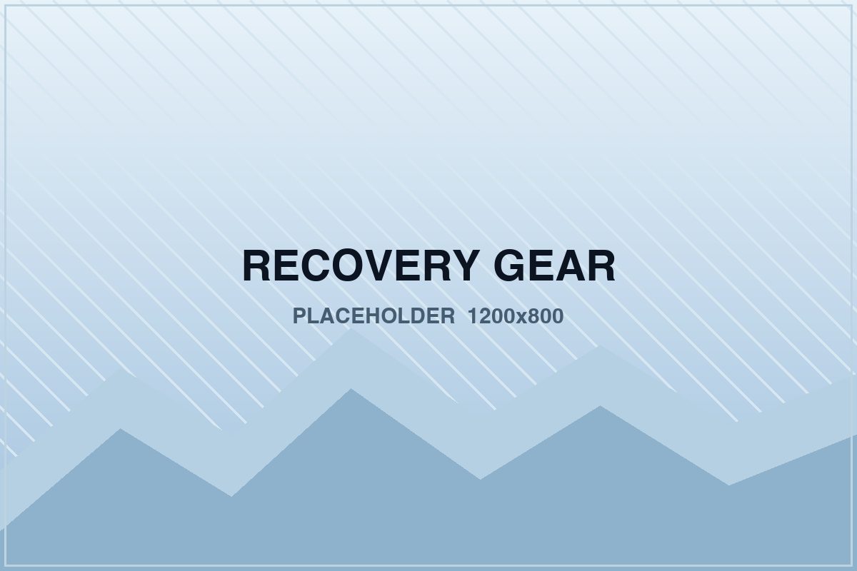 Recovery gear including straps, shackles and a winch laid out on the ground